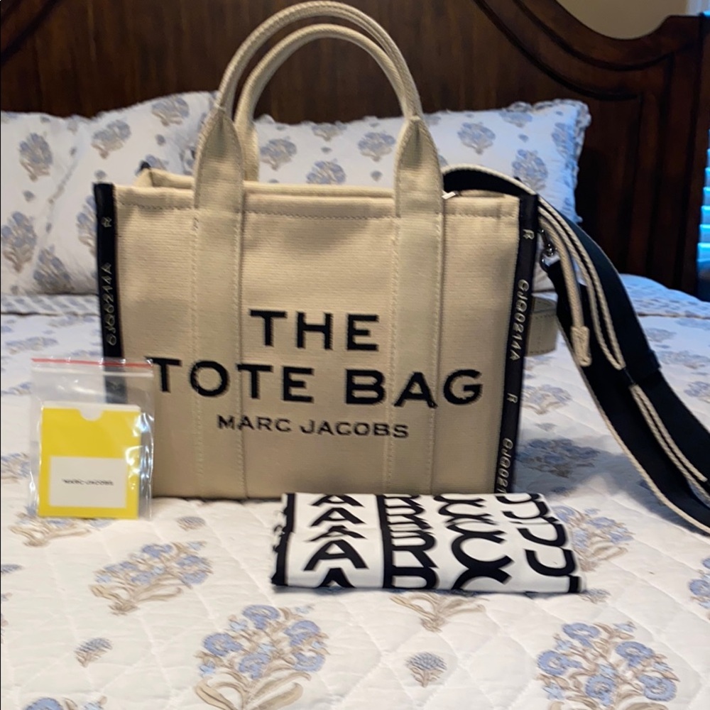 Marc Jacobs
The Jacquard Medium Tote Bag  w/ Dust Bag and bag insert.